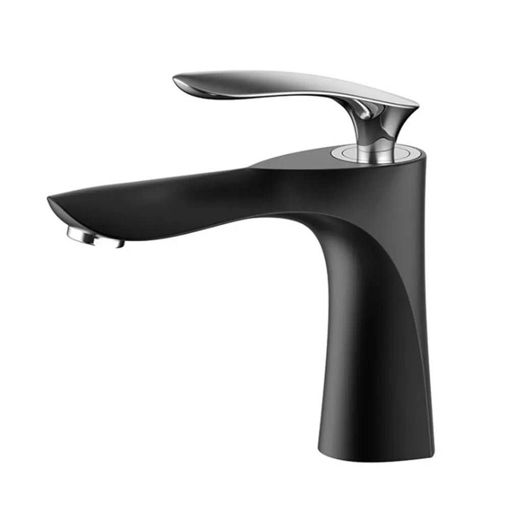 Hot and Cold Faucet in the Bathroom Basin